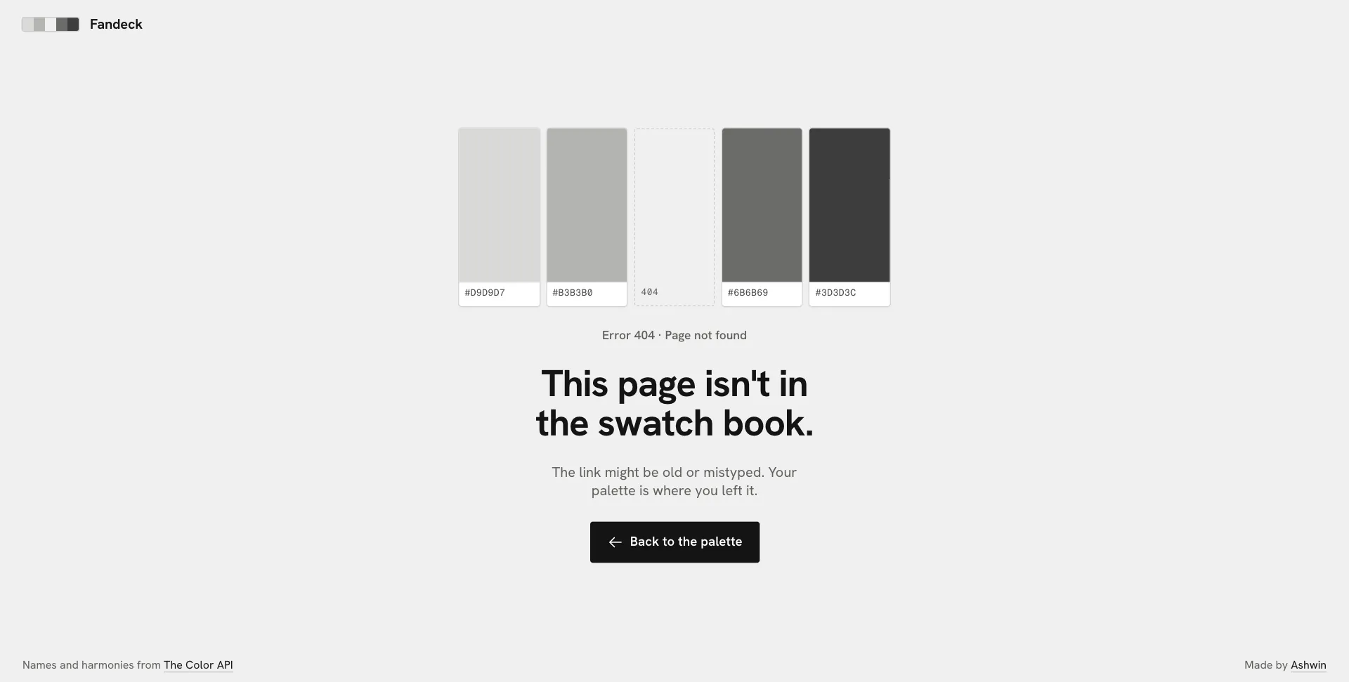 A swatch book of greys with the middle chip missing